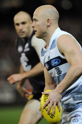 Carlton v Geelong. MCG. Chris Judd follows Gary Ablett Jr. Picture: George Salpigtidis