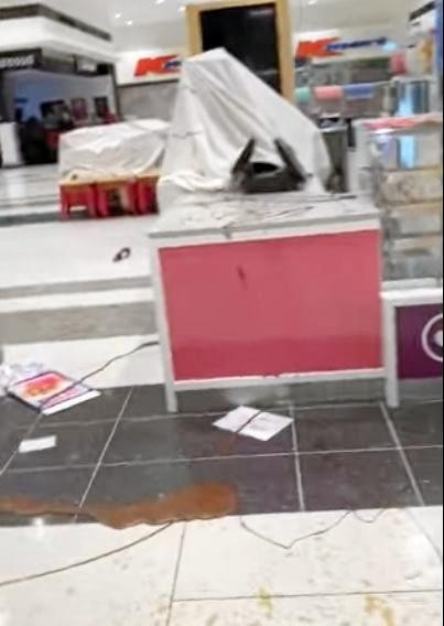 Shots from the video footage Jacinta Corbett took on her phone after vandals targeted Stockland's Donut King on Thursday night.