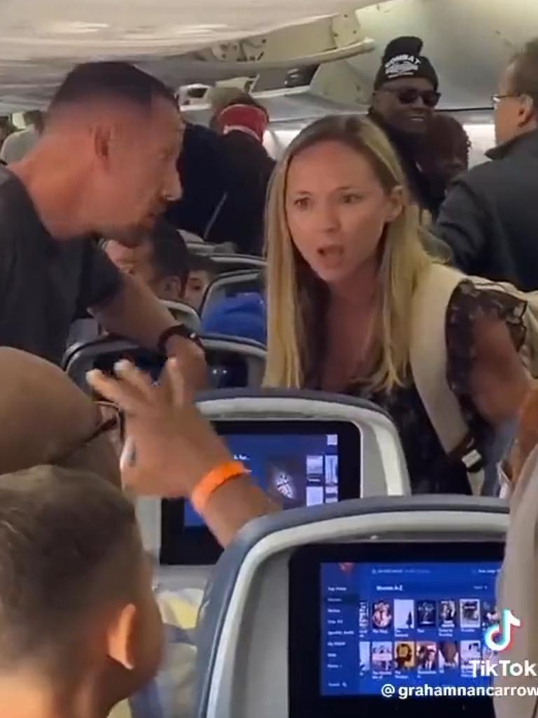 The woman claimed a fellow passenger had pushed her seat the entire flight.