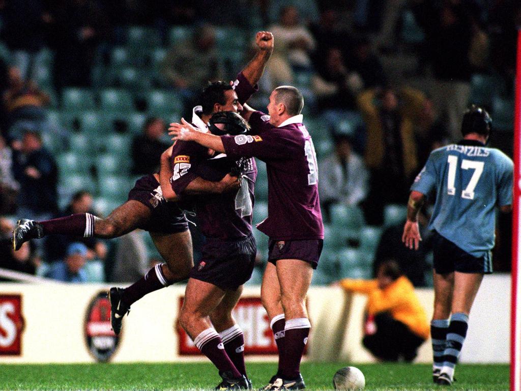 Tonie Carroll is congratulated in 1998.
