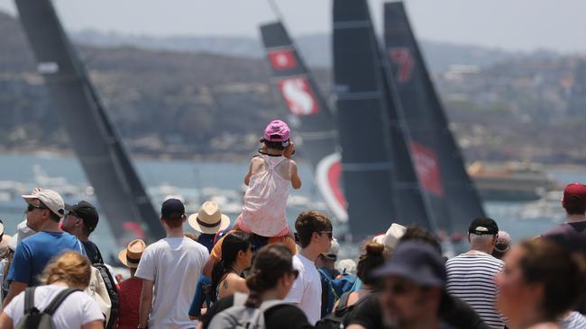 Crowds gather near Hornby Lighthouse on South Head at the start of the 2019 race to Hobart.