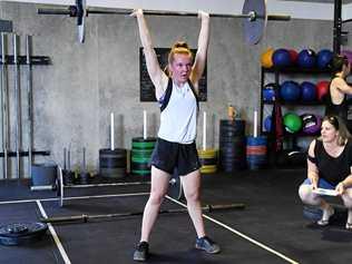 GUT-BUSTING: Gympie Crossfit athlete Charlie Morgan competes in the final open workout of the five-week global program. Picture: Troy Jegers