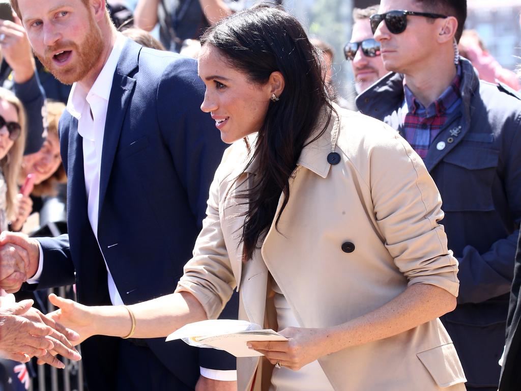 Meghan meeting and greeting her fans.