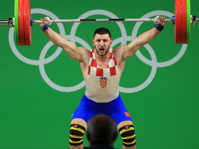 RIO DE JANEIRO, BRAZIL - AUGUST 12: Amar Music of Croatia during the Weightlifting - Men's 85kg Group B on Day 7 of the Rio 2016 Olympic Games at Riocentro - Pavilion 2 on August 12, 2016 in Rio de Janeiro, Brazil. (Photo by Mike Ehrmann/Getty Images)