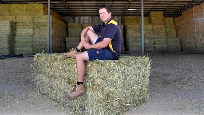 Farmer/hay producer Corbin Schuster, 29, with the last of his hay supply in Freeling. Picture: Tricia Watkinson