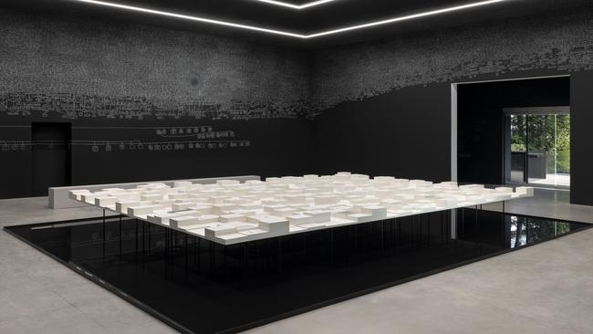 Stacks of government documents suspended above the memorial pool at Archie Moore’s kith and kin at the Australia Pavilion at the Venice Biennale 2024. Picture: Andrea Rossetti