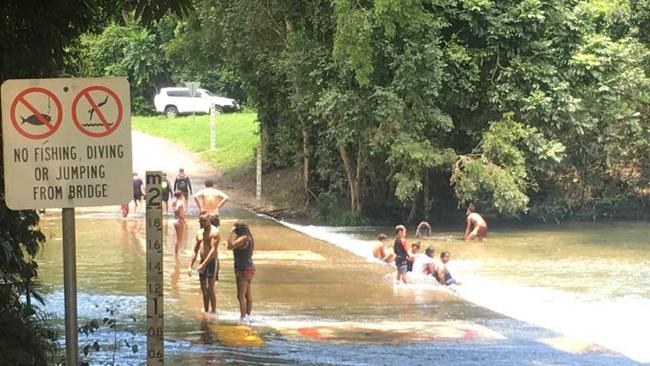 In 2019, swimmers congregating on the Behana Creek causeway drew the ire of Cairns Regional Councillor Brett Moller, who worried it was only matter of time before a child was hit by a car. PICTURE: SUPPLIED