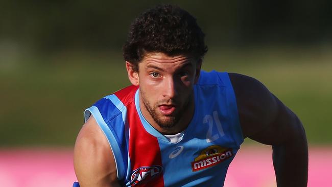 Tom Liberatore of the Bulldogs handballs during the Western Bulldogs AFL training session at Whitten Oval on April 18, 2017 in Melbourne, Australia. (Photo by Michael Dodge/Getty Images)