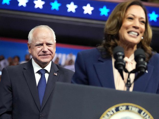 PHILADELPHIA, PENNSYLVANIA - AUGUST 6: Democratic vice presidential candidate Minnesota Gov. Tim Walz looks on as Democratic presidential candidate, U.S. Vice President Kamala Harris speaks during a campaign event at Girard College on August 6, 2024 in Philadelphia, Pennsylvania. Harris ended weeks of speculation about who her running mate would be, selecting the 60-year-old midwestern governor over other candidates.   Andrew Harnik/Getty Images/AFP (Photo by Andrew Harnik / GETTY IMAGES NORTH AMERICA / Getty Images via AFP)