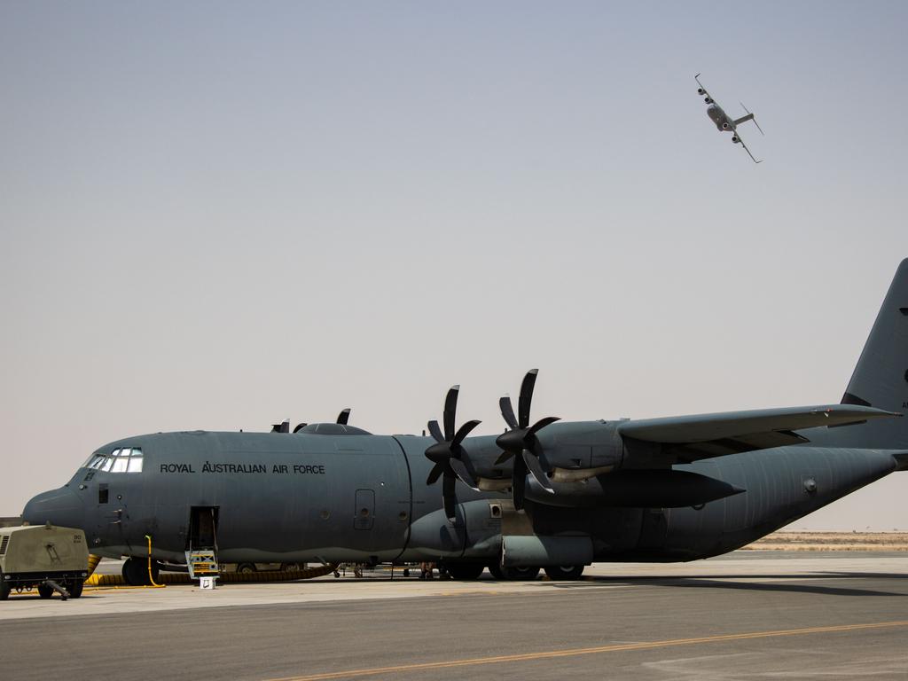 Australians and Afghans on board two Royal Australian Air Force C-17A Globemaster III aircraft have arrived in Perth on Friday morning. Picture: SGT Glen McCarthy/Australian Department of Defence