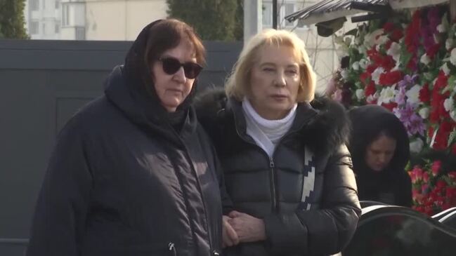 Navalny's mother visits his grave in Moscow