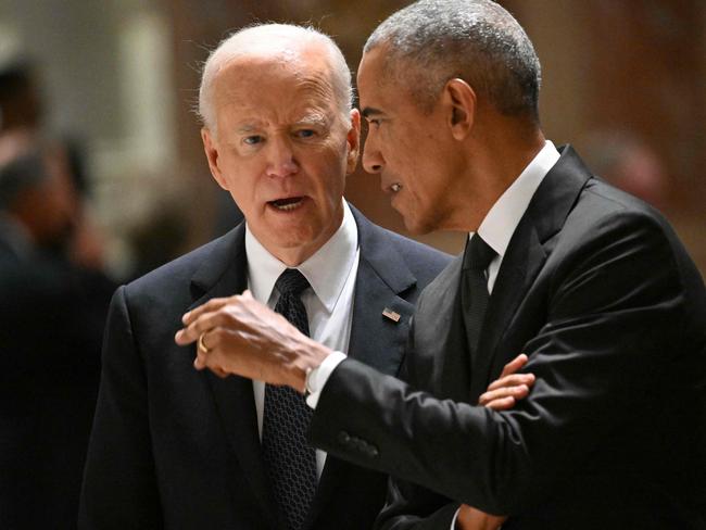 Joe Biden speaks Barack Obama during Ethel Kennedy’s memorial service. Picture: Mandel Ngan/AFP