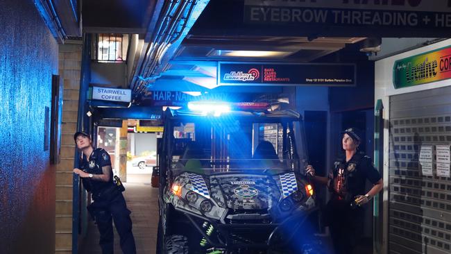 Constable Arna Van Dorp and Acting Sergeant Susie Whitaker checking on stores while on patrol in Surfers Paradise. Picturel: Glenn Hampson