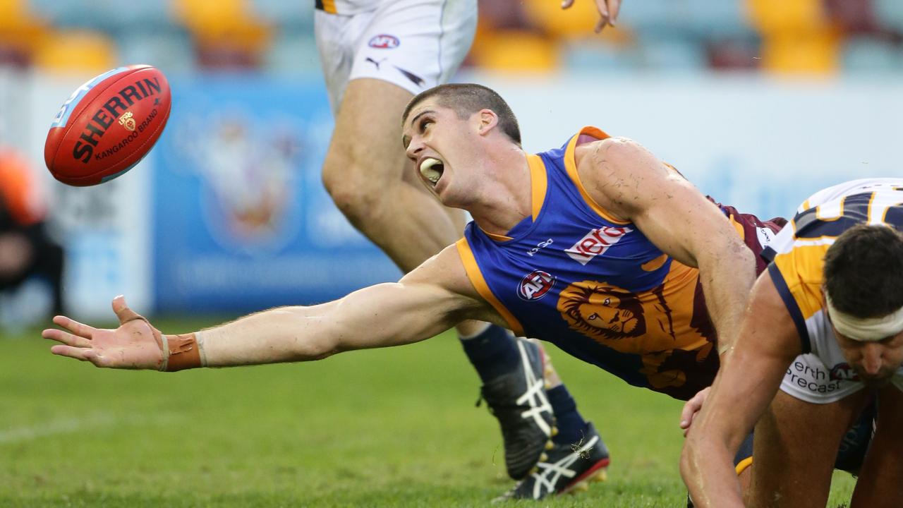 Jonathan Brown of the Lions just fails to take a mark during the AFL match between the Brisbane Lions and the West Coast Eagles at the Gabba. Pic Darren England.