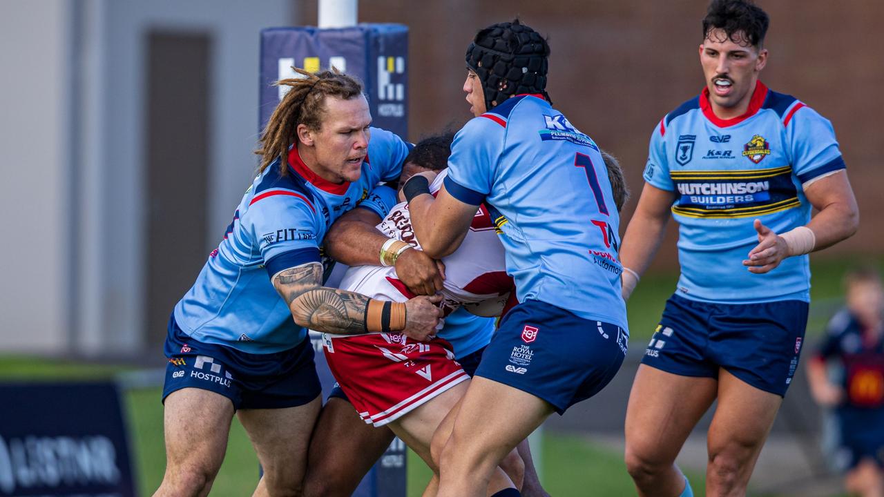 Blake Lenehan (left) and Esom Ioka combine for a tackle. Picture: Benny Hassum Photography