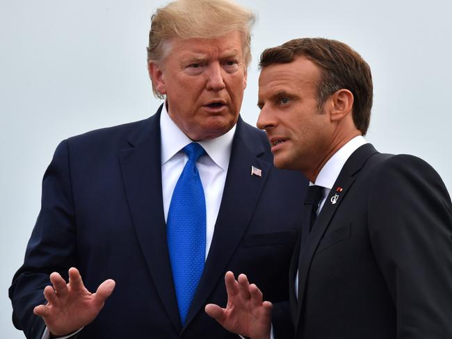 French President Emmanuel Macron chats with US President Donald Trump at the Biarritz lighthouse, southwestern France. Picture: AFP