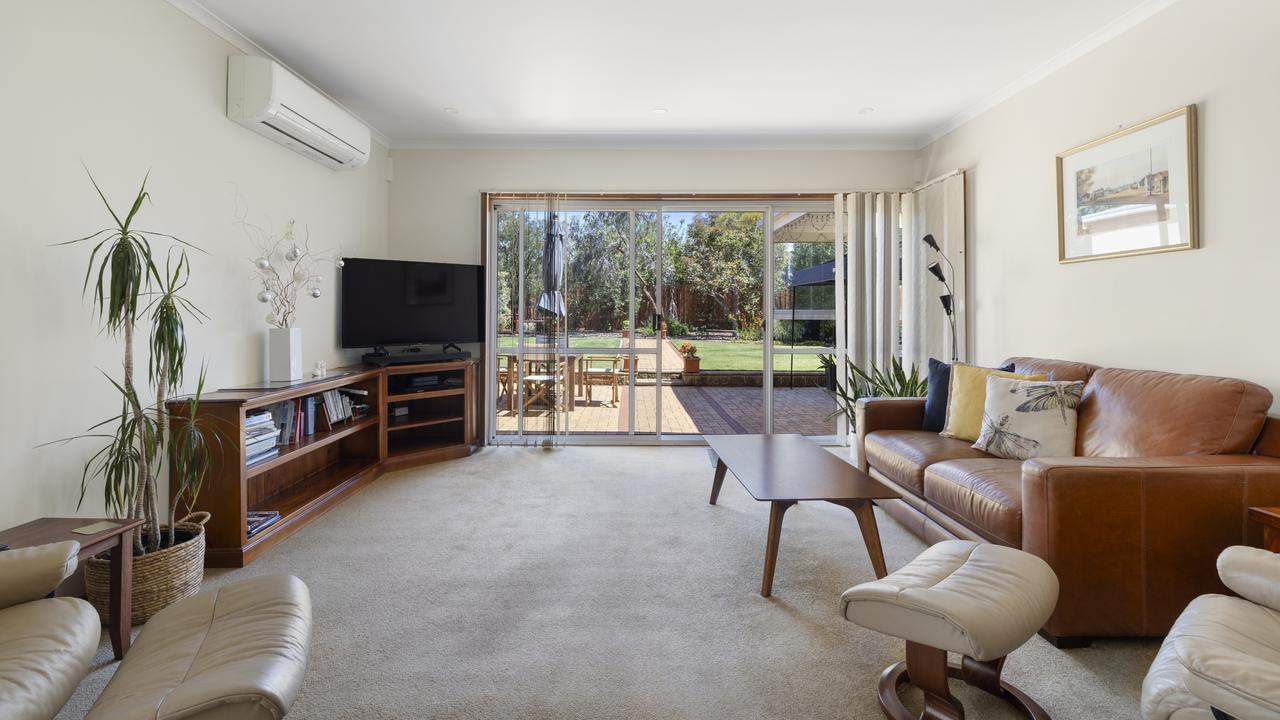 The large family room at the rear of the property.