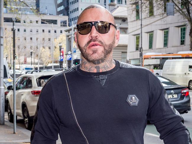 Toby Mitchell arrives at the Melbourne Magistrate's Court for breaching his CCO.. Picture: Jake Nowakowski