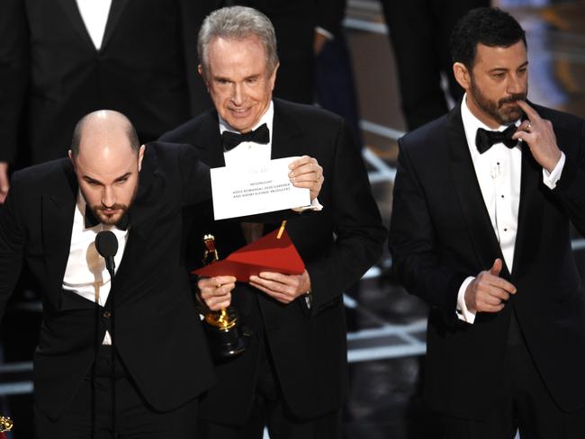 Jordan Horowitz shows the envelope revealing Moonlight as the true winner of best picture at the Oscars. Picture: AP