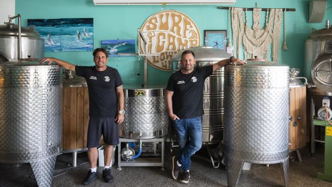 Justin and Shane Henwood with some of the vats for their upcoming microbrewery in their Yamba Backpackers site.