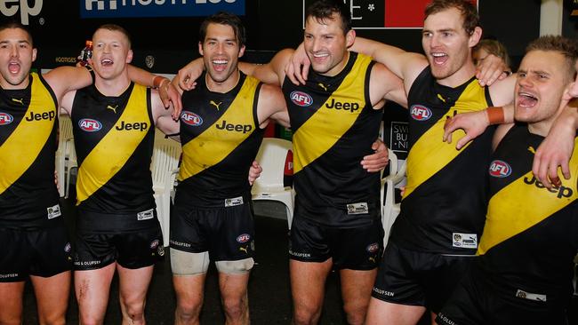 Alex Rance (third from left) sings the Tigers song. Shaun Hampson says the star defender was later seen Googling himself. Picture: Getty Images