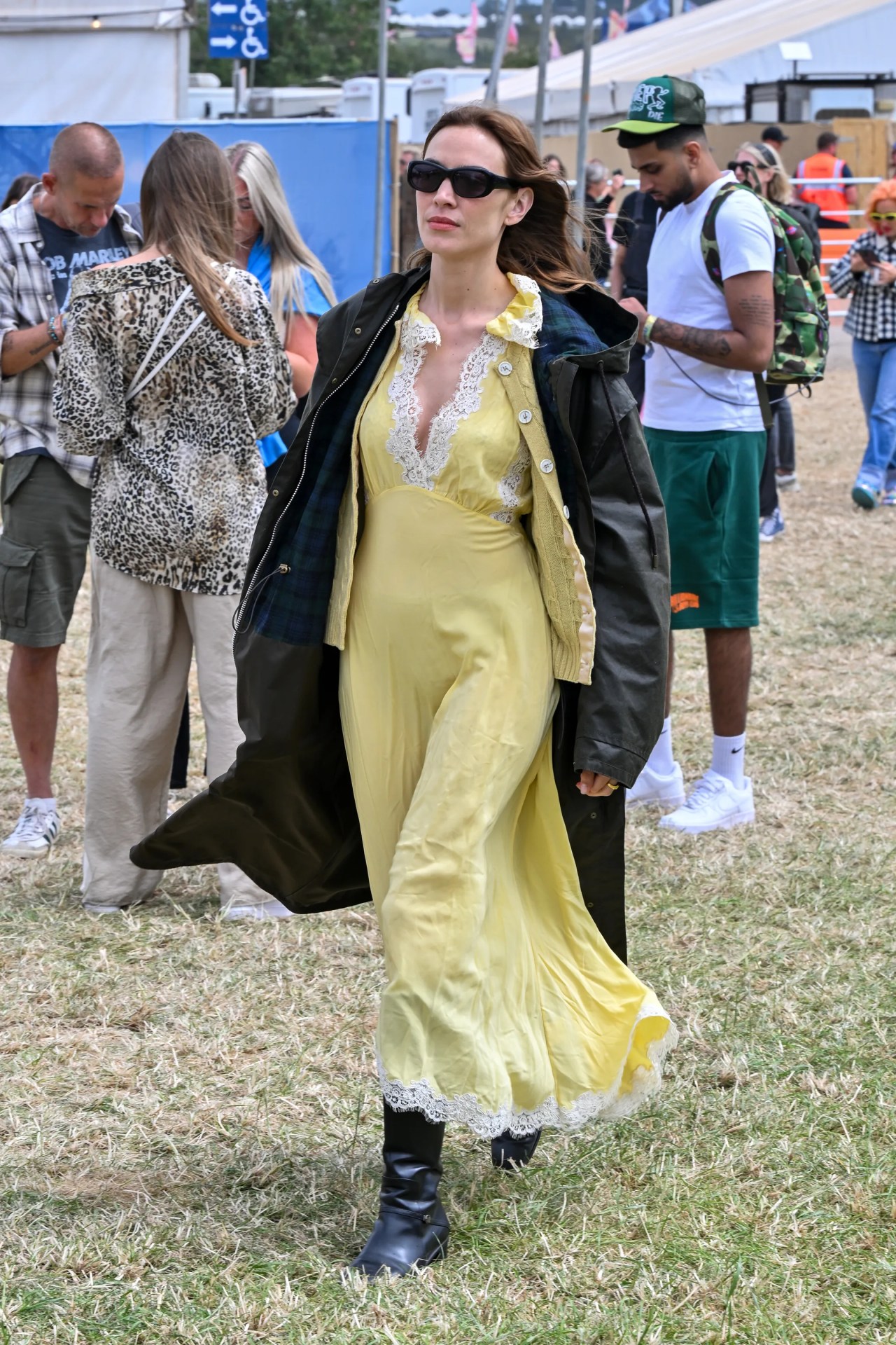 <h3><b>The floaty midi dress</b></h3><p>A breathable dress, quintessentially British outerwear, and boots: if we had to condense Chung&rsquo;s taste for festival garb into a single formula, it might look a little something like that. It was certainly the recipe she turned to in 2024, when she was spotted in a yellow midi dress, cardigan and parka &mdash;tall patent boots, peeking out from underneath the hem. Present were the elevating elements&mdash;sunglasses, of course&mdash;but there&rsquo;s a practicality too that Chung relies on, that&rsquo;s key to her style. A look to take to Glastonbury or the grocery store.</p>