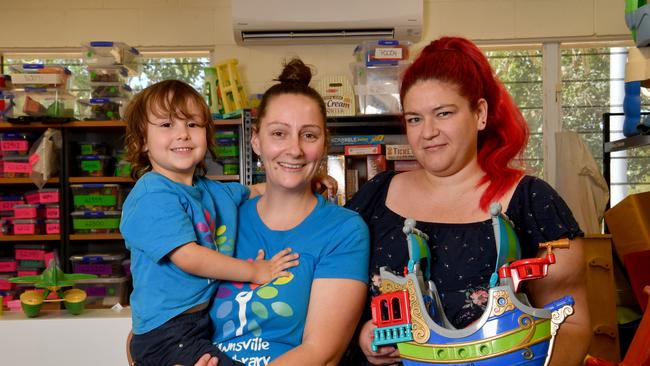 Stacey Prenter, with William, 4, and Teele Sullivan with the new aircon at the Townsville Toy Library. Picture: Evan Morgan