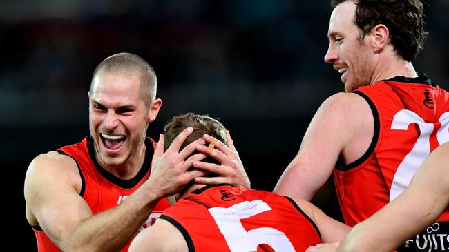 David Zaharakis celebrates a goal with teammates.