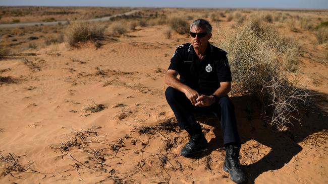 Sen-Constable Stephan Pursell outside the remote outback town of Birdsville in 2018. Picture: AAP Image/Dan Peled