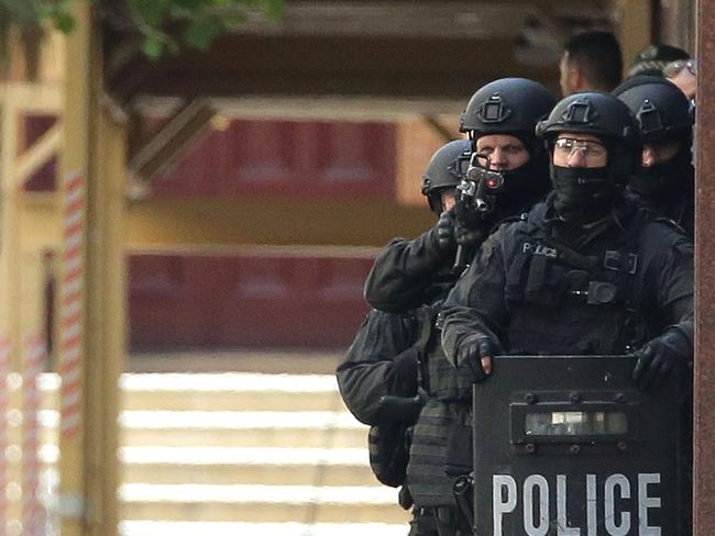 Police waited for a command for about 17 hours outside the Lindt Cafe. Picture: Getty Images