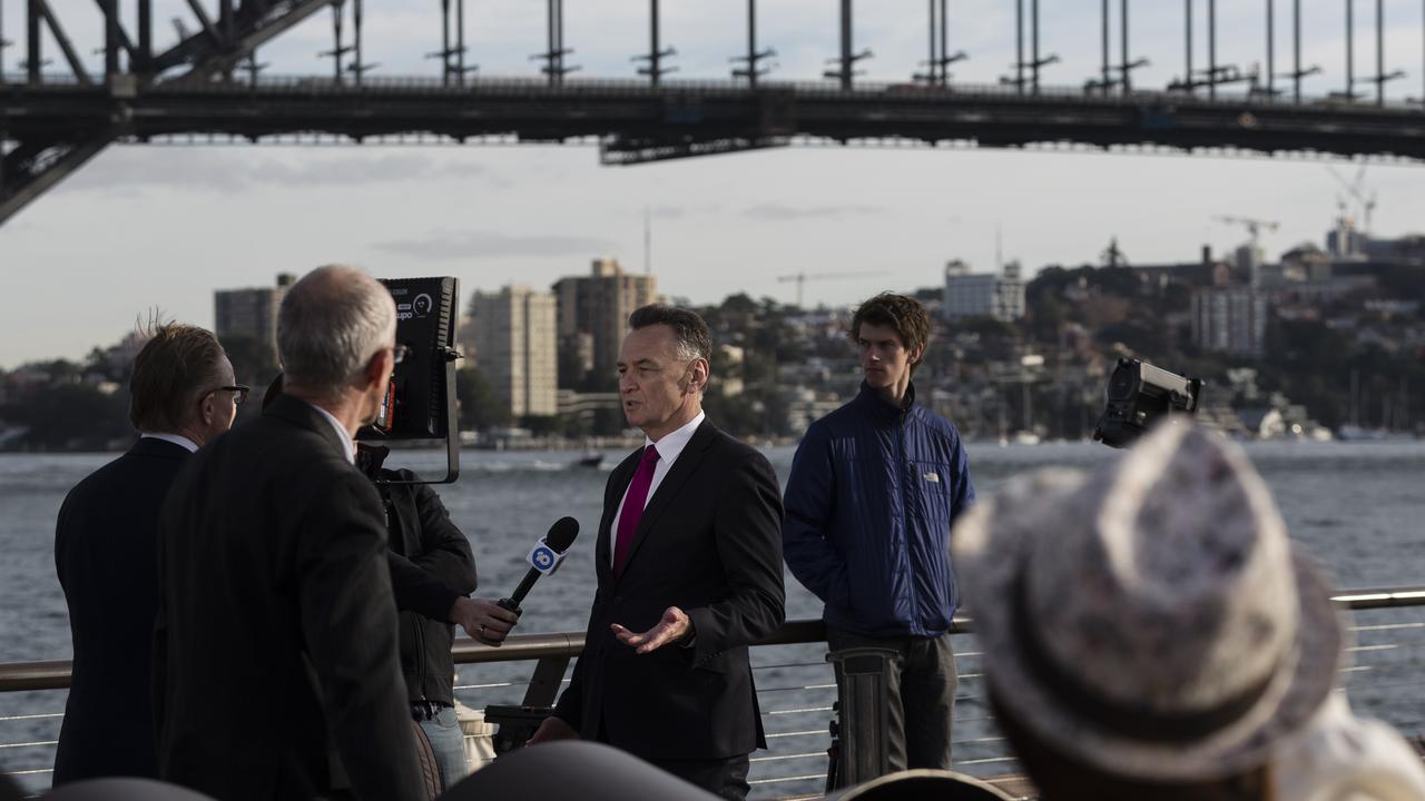 Craig Emerson talks to media outside the Sydney Opera House this morning.