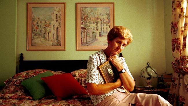 Joan Clayton holds a photo of her mother Bertha Moss, victim of British serial killer Dr Harold Shipman. Picture: Patrick Hamilton.