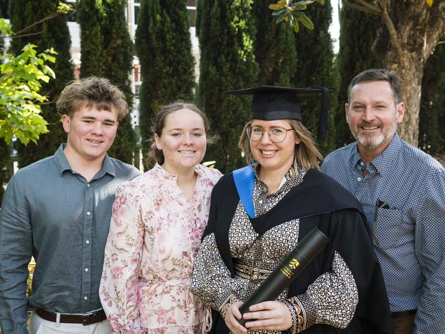 Bachelor of Science graduate Amy Foster with family (from left) Lachlan Ivinson, Elisa Ivinson and John Mooney at a UniSQ graduation ceremony at Empire Theatres, Tuesday, October 31, 2023. Picture: Kevin Farmer