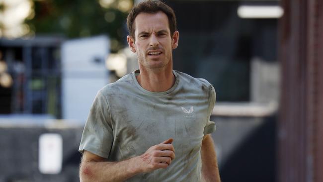 NCA. MELBOURNE, AUSTRALIA. 28th November 2024.  Retired English tennis player Andy Murray in town filming a TV commercial where he is running around Melbourne being chased .      .  Picture: Michael Klein