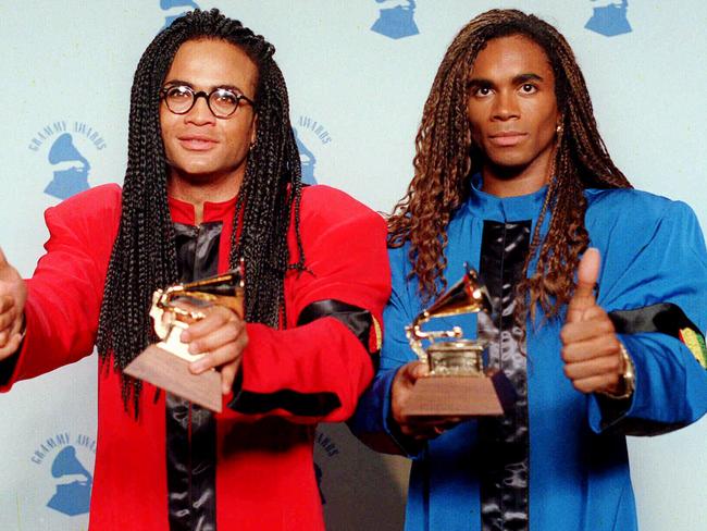 Robert Pilatus (l) with Fab Morvan from pop band Milli Vanilli holding Grammy awards. band/milli/vanilli
