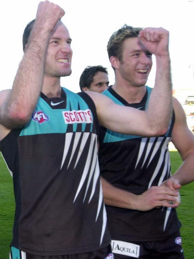 Josh Francou and Stuart Dew during their playing days with Port Adelaide in 2002.