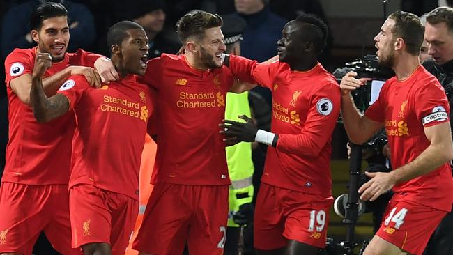Liverpool celebrate. / AFP PHOTO / Paul ELLIS