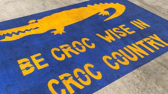 A crocodile warning sign at a Cairns boat ramp. Picture: Duncan Watersports