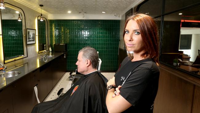 Holly Shadlow a barber at Jimmy Rod’s in Brisbane. Photo: Steve Pohlner