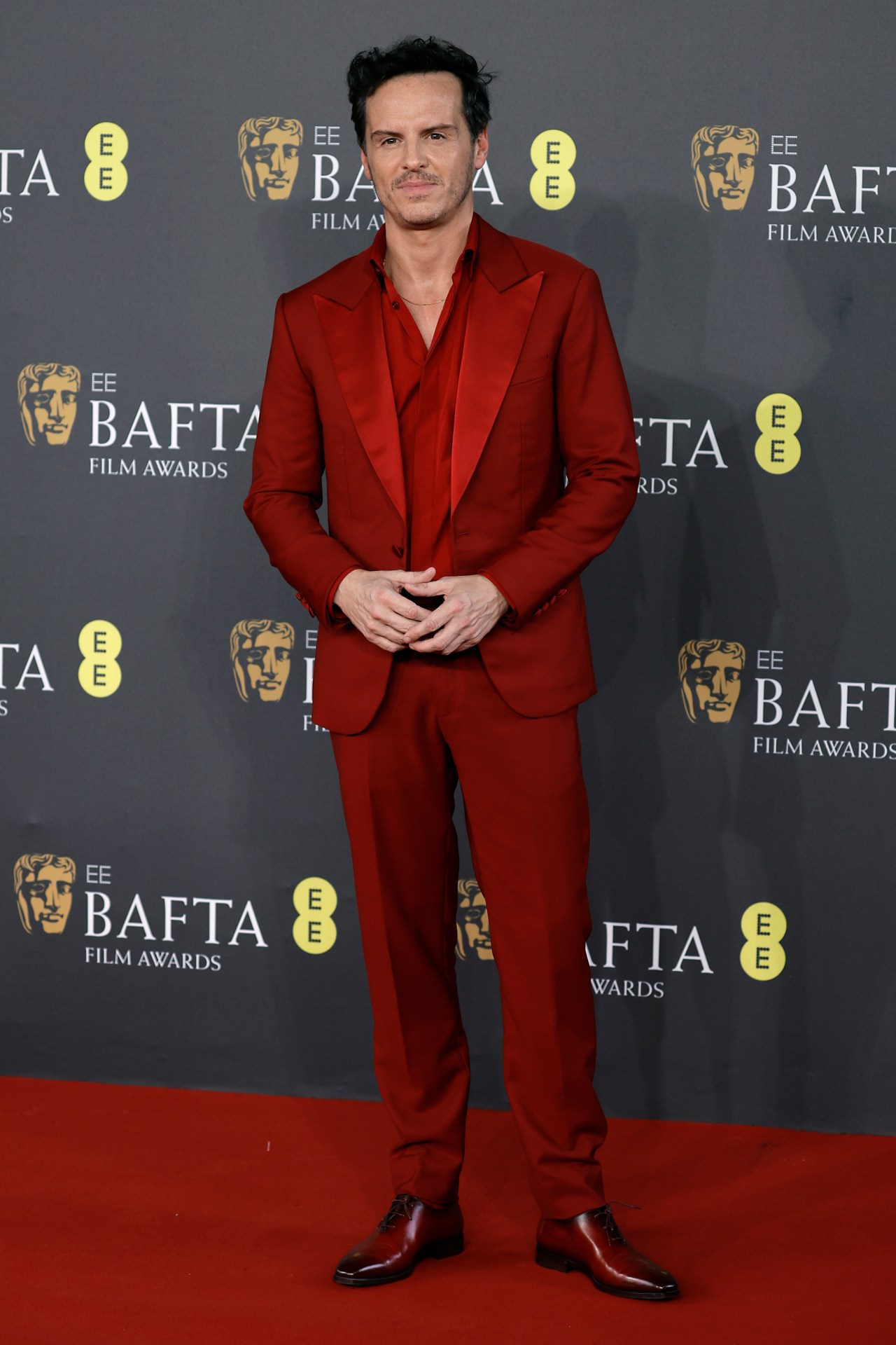 <p>It&rsquo;s not just in a yellow coloured suit that Scott can hold a room. For the 2024 BAFTAs, he was in custom Berluti, draped in a lavishing shade of scarlet. Not an easy colour to pull off by any means. And Pedro Pascal, who also donned a splash of red for the <a href="https://www.gq.com.au/style/celebrity/pedro-pascal-bella-ramsey-met-gala-2023/image-gallery/e87e8df6122d810a69ab41db9c544cc5" target="_blank" rel="noopener">2023 Met Gala</a>, summed it up best in a comment on Baker&rsquo;s <a href="https://www.instagram.com/p/C3gyBqArVi4/?hl=en" target="_blank" rel="noopener">Instagram post</a>&mdash; &ldquo;red hot&rdquo;. Scott is showing that you <em>can</em> lean into alternate shades in the suiting catalogue and not look like you&rsquo;ve sprung from an early noughties music video.</p><p>&nbsp;</p><p>It&rsquo;s hard not to draw comparisons to the other Irish star of the red carpet, <a href="https://www.gq.com.au/style/celebrity/paul-mescal-is-the-grand-redeemer-of-the-henley-shirt/image-gallery/089e3886109b2a72e030396204f67e0c" target="_blank" rel="noopener">Paul Mescal</a>, who stars alongside Scott in <em>All Of Us Strangers</em>. Mescal, who seems quite entrenched in a new Gucci era, is tapping into an old-school sexiness and countering the new-age insouciance of Scott. Whatever side you land on, there&rsquo;s no doubting the range of the Irish&mdash;and yes, that includes <a href="https://www.gq.com.au/style/celebrity/barry-keoghan/image-gallery/71b97a6d790aa3a60e92a008d1307a16" target="_blank" rel="noopener">Barry Keoghan</a>.</p>