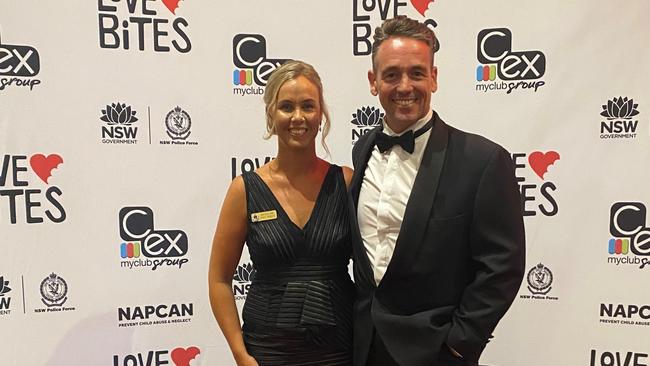 Love Bites Charity Ball MCs, Northern Region DV Coordinator Kiah Bowen and Coffs Coast firefighter David Laarhoven.