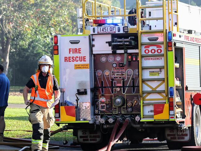 Scene of a serious structure fire that took hold of a shed on a property at Alberta Drive, Woree. Queensland Fire Department firefighters controlled the blaze, while Queensland Police officers cordoned off the immediate area. Picture: Brendan Radke