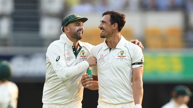 Nathan Lyon (L) and Mitchell Starc chipped in as part of a concerted team-bowling effort. Picture: AAP