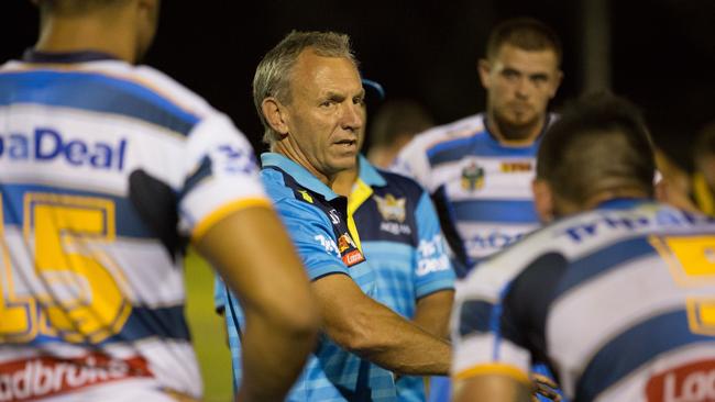 Titans coach Neil Henry addresses his team.