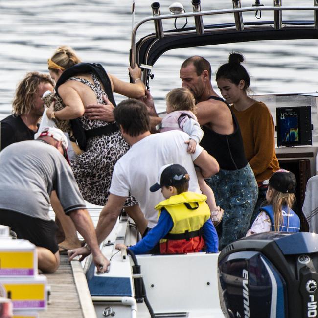 Locals use their own boats to take supplies to isolated towns. Picture: Darren Leigh Roberts