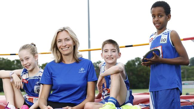 WEEKEND TELEGRAPH 14TH FEBRUARY 2025Pictured at Campbell Field in Canterbury are Canterbury Little Athletics member Riley Dickey, Club President Ljiljana Sentas and club members Harrison Davies and Fuad Ogle.The club got a federal grant for a high jump storage cage.Picture: Richard Dobson