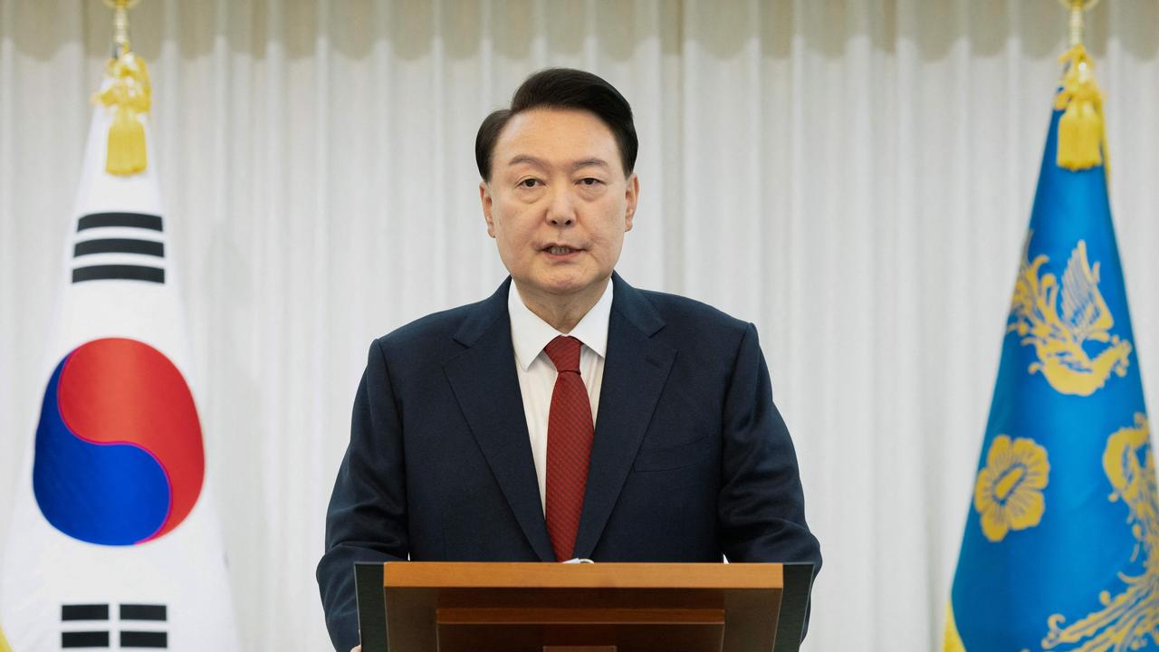 South Korean President Yoon Suk Yeol said he would "step aside" after parliament voted to remove him from office, urging an end to "politics of excess and confrontation". Picture: AFP.