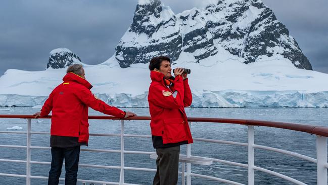 Guests on the deck of the ship.