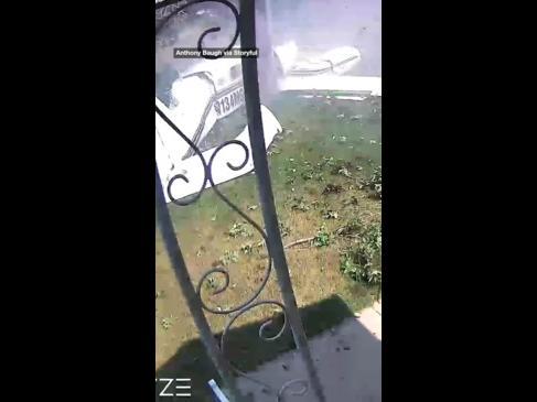 Small plane dramatically crashes into front yard