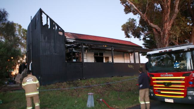 Fire destroyed the Middle Park light rail station and cafe on February 20. 2018. Picture: David Crosling